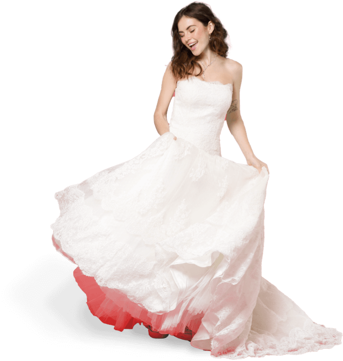 a woman dancing in her wedding dress