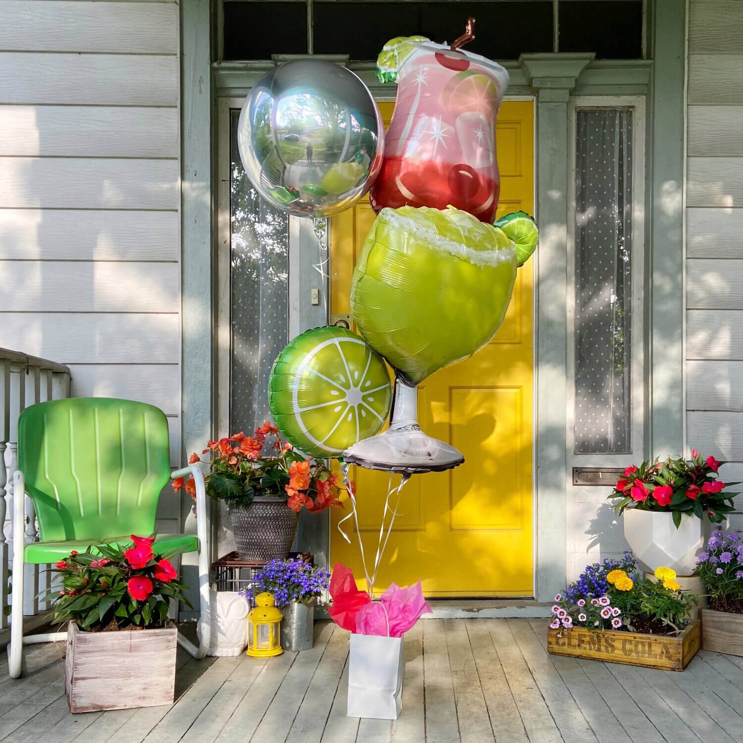 Oversized helium bouquet with margarita, lime slice, and pink tropical drink balloons from Just Peachy in Little Rock, Arkansas.