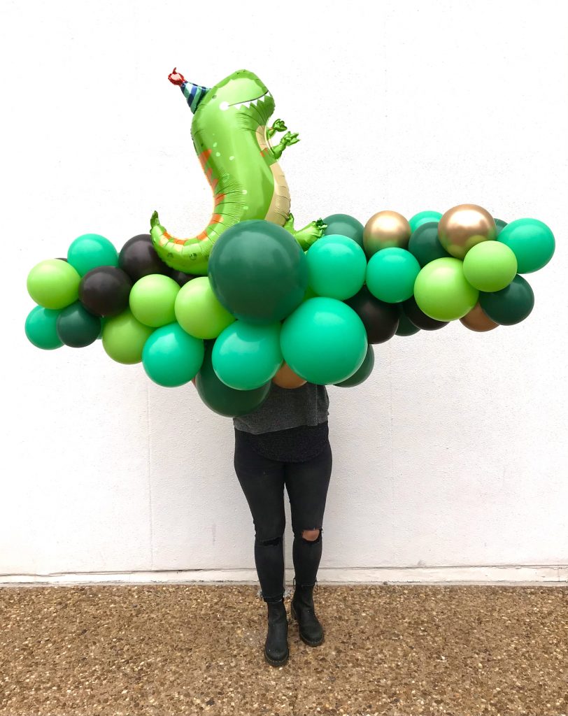 Dashing Dino balloon garland for birthday parties from Just Peachy, balloons and gifts in Little Rock.
