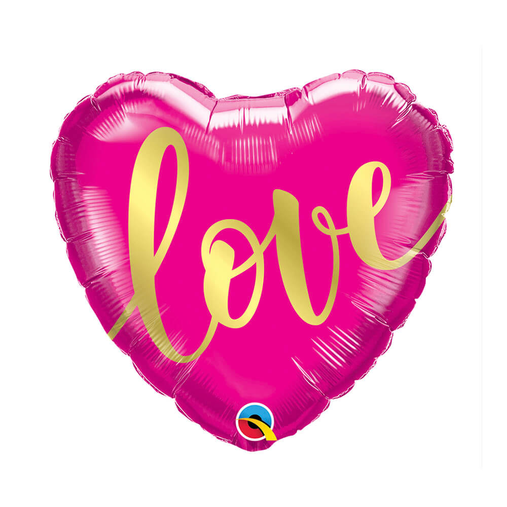 Hot pink with gold metallic script that reads “love” heart shaped mylar helium balloon from Just Peachy in Little Rock.