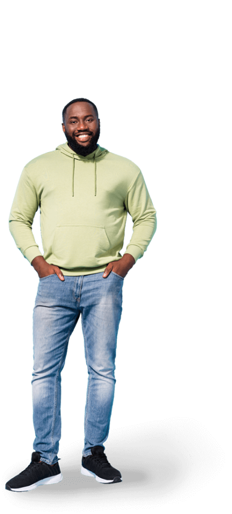 Black Man Standing with Hands in Pocket