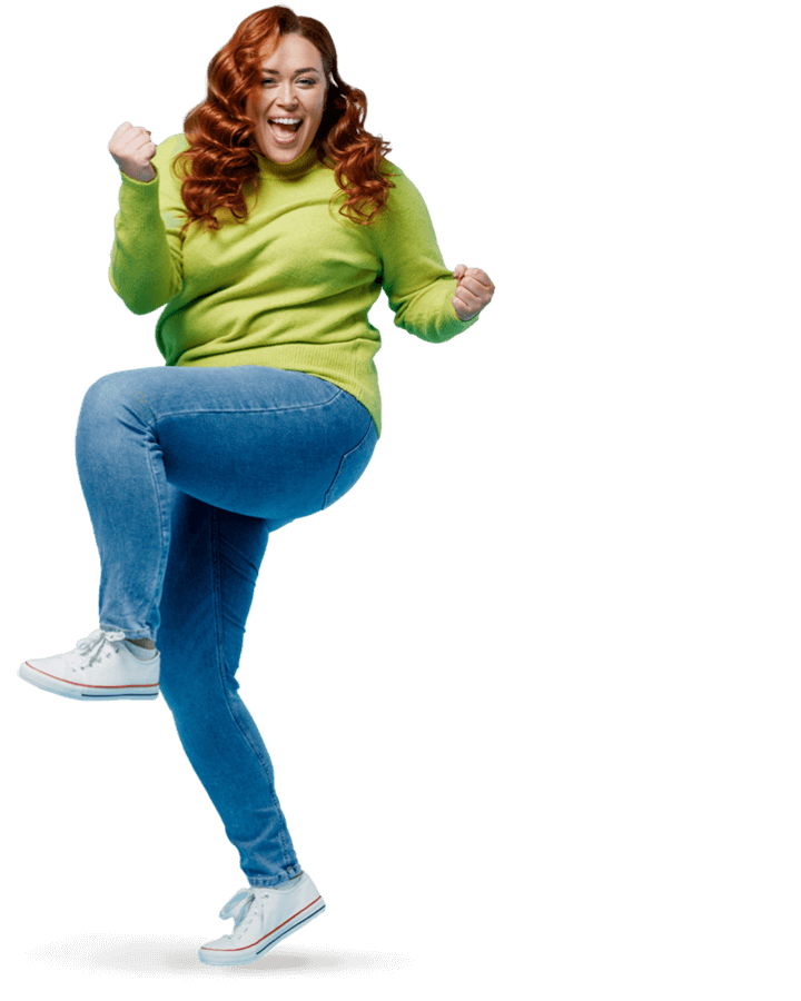 Happy woman in bright green shirts and jeans